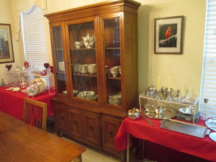 Rosemarie Service for 12 with serving pieces inside china cabinet