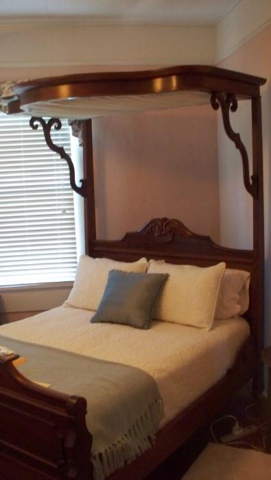 Antique half canopy bed