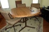 table w/4 chairs on rollers