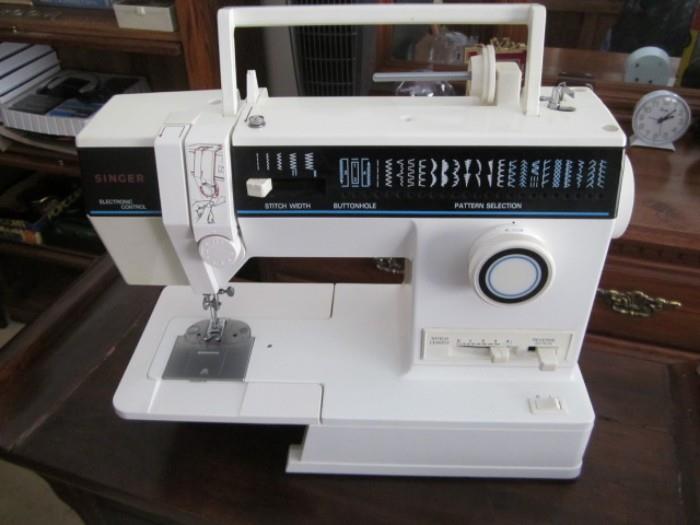 Never used Singer sewing machine with foot control.
