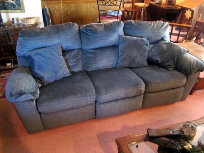 Recliner couch. Two end units recline.