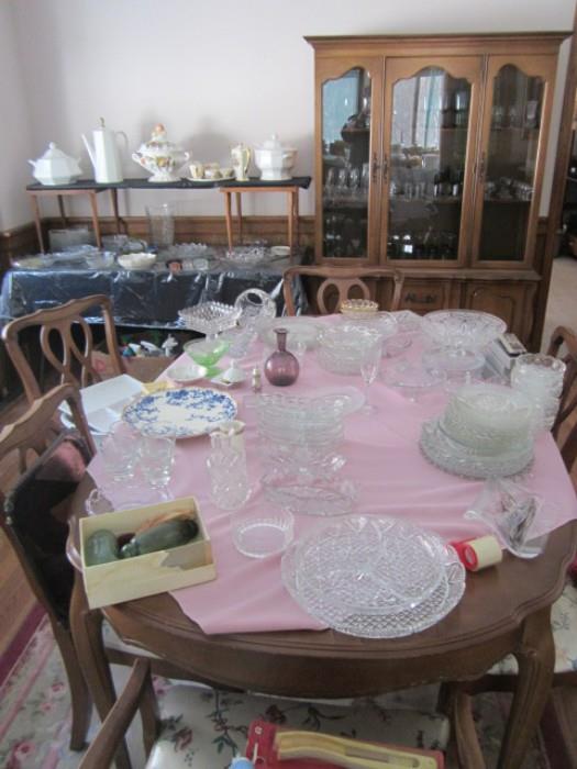 Dining table & chairs, china cabinet & misc. glass.