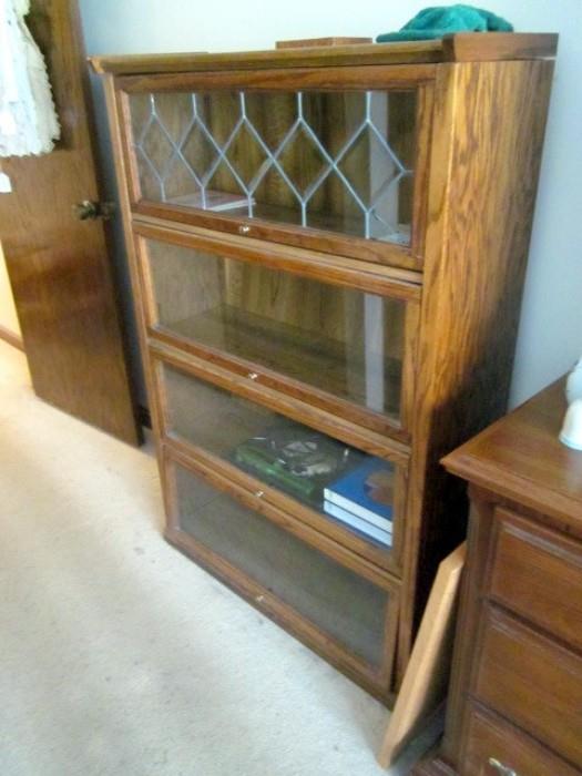 Oak Barrister's bookcase with leaded top window.