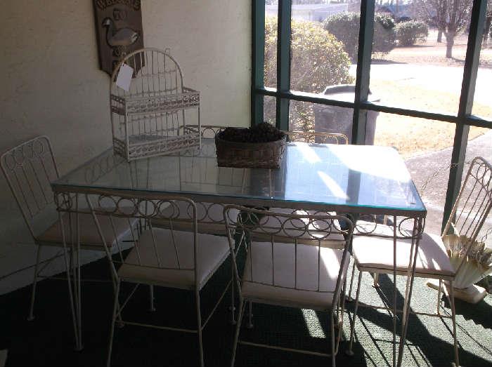 Vintage glass top metal table and six chairs