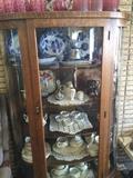 1 of 3 curved glass curio cabinets