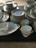 another set of dishes with rose trim