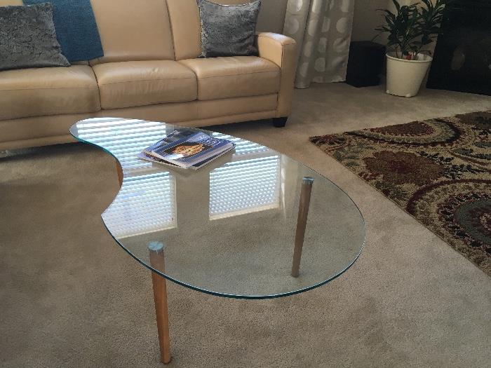 Nice contemporary coffee table will also blend well with a mid century look