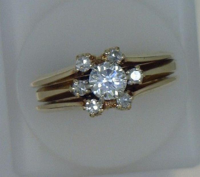 14K yellow gold solitaire with diamond insert/jacket - .75 Ct total diamond weight