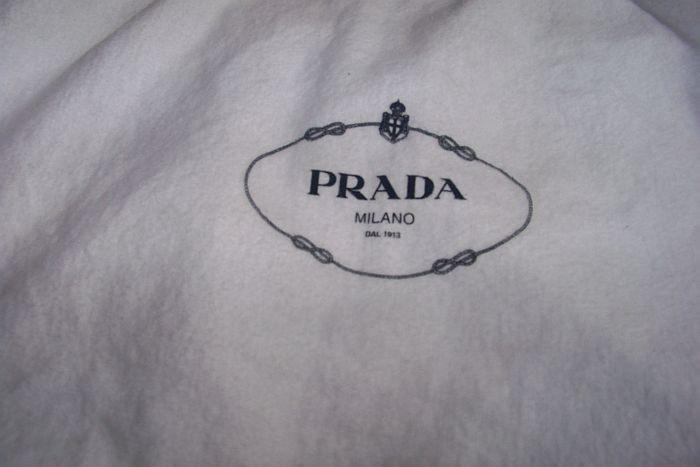 Prada - original and real Prada purse with the original cloth bag - purchased in Italy - complete with authenticity card - purse is like new.