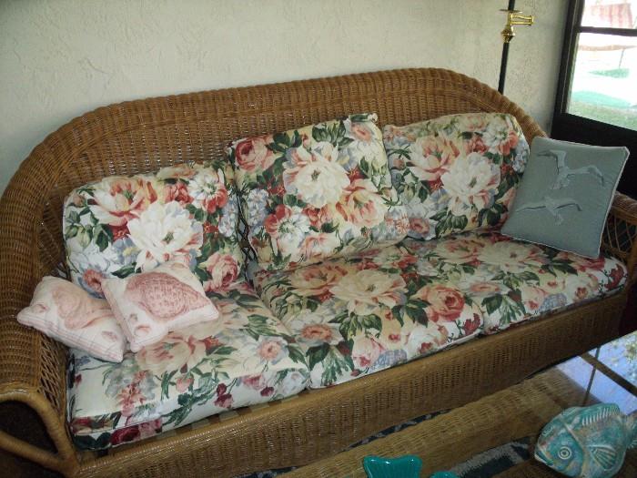 natural wicker sofa with cushions