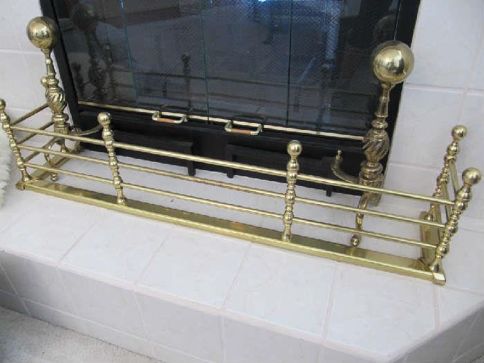 Classy Brass Fireplace Surround with Andirons