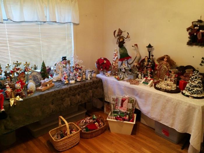 Entire room of Christmas items- Hallmark, figurines, ornaments and more.