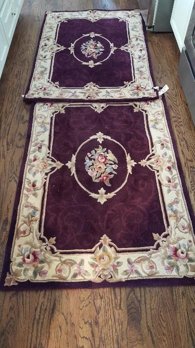 pair of chines sculptured rugs that have been to martinous for cleaning