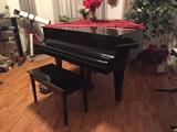 K. Kawai black lacquer baby grand piano