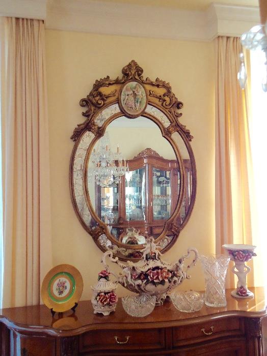 Large Italian mirror with porcelain medallion, Capodimonte pieces, cut glass bowls