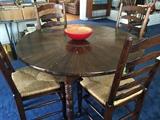 Antique English round table and ladder back chairs