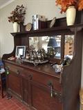 Antique buffet with silveplate tea set