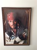The Mrs. loves Johnny Depp so much that her husband had him framed!!