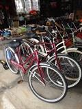 The Red ones are Murray his & hers matching. The White one is a Girls Huffy and the Green is a Girls Hollywood by Schwinn.
