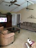 Extra long couches, display tables, nesting tables, wall decorations, lamps, entertainment center, etc. 