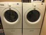 Frigidaire front loading washer and dryer with pedestals. 