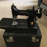 Antique Singer sewing machine. First electric machine Singer made. 