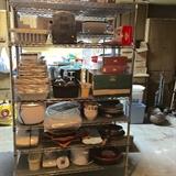 Assorted kitchen items, serving dishes, rice pot, crock pot, bowls, etc.