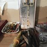 Assorted screw drivers, portable lights and assorted sockets. 