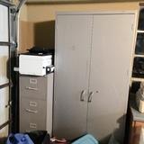 Metal file cabinet and storage cabinet and copier. 