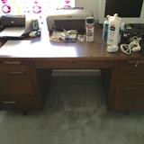 Solid wood desk with matching 2 drawer file cabinet. 