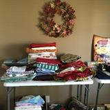 75+ tablecloths for all occasions and holidays. Some with matching runners. Round and oblong. 