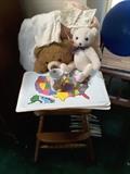 Vintage Wood High Chair comes with strap. 2 Teddy Bears. Vintage doll clothing, bib. Some plastic place mats. Small coat hangers below for children's clothing items.