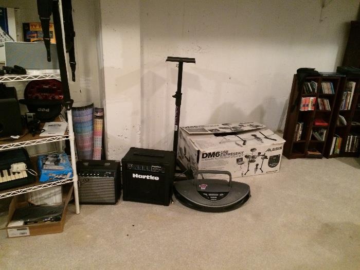 Drum set in box, prop stand for stage, amplifier, music cd collections 