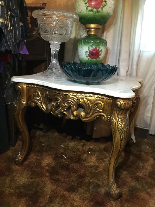 We have a pair of these marble top end tables with a matching coffee table
