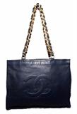 GORGEOUS CHANEL navy blue leather shopper tote in very good condition. Navy blue lambskin leather exterior with the signature CC Chanel logo quilted along the front side with heavy duty gold chain and leather shoulder straps. Matching navy blue leather interior with 1 side zippered pocket and ample storage space for all your belongings. This piece is in very good condition. No stains or smells. Clean corners, and interior. Some very delicate scuffs throughout from age and use but they do not detract from the overall look or use of this piece. This Chanel tote is perfect for work or play as it comfortably carries laptops, ipads, magazines, notebooks, or anything else you may need to travel with. Its timeless design is perfect for any season and will surely become a wardrobe staple for many years to come.
Purchase includes a dust cover
Measurements: 16"x12"x4.25" 12" drop

Free shipping for this item within the continental US.

