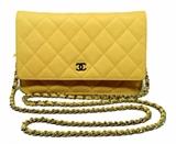 CHANEL rare mustard yellow wallet on a chain in very good condition. Mustard yellow quilted leather exterior trimmed with silver hardware and woven chain and leather shoulder strap. Single flap style snap closure opens to a navy blue nylon and leather interior that holds 6 credit card pockets, 2 slit pockets, and 2 zippered pockets. The shoulder strap can be tucked away to use this piece as a clutch or left out for use as crossbody or shoulder bag. This WOC is in very good condition. No stains, smells, or scuffs. Clean corners, edges, and interior. Perfect for brightening up any occasion, the WOC is one of the most popular designs by Chanel. This piece is no exception and will surely last a lifetime in timeless Chanel style.
Purchase includes a dust cover.
Measurements: 7.5"x5"x2" 22" strap drop

Free shipping for this item within the continental US.