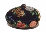 STUNNING JUDITH LEIBER swarovski crystal floral faberge egg minaudiere in excellent condition. Black swarovski crystal exterior with a multi-color floral design throughout the exterior. Side button closure opens to a gold leather lined interior that holds an attached gold chain shoulder strap to easily convert this piece from clutch to shoulder style to suit your taste. This piece is in excellent condition. No stains, smells, scuffs, or missing crystals. Clean edges and interior. light scuffs on interior leather from use but they do not detract from the overall appearance or use of this piece. This is a must-have for Judith Leiber lovers. The gorgeous Swarovski crystal exterior coordinates with any wardrobe choice for any formal occasion and will surely stand the test of time in classic Leiber style. 
Purchase includes a dust cover, coin purse, pocket mirror and comb and original manufacturers card.
Measurements: 6.5"x4"x4" 20" strap drop

Free shipping for this item within the contine