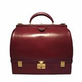 This rare Hermes Sac Mallette is in very good vintage condition. The exterior features beautiful rouge red box calfskin leather trimmed with the signature gold Hermes hardware. The top compartment opens through two slide latches and a push button closure that reveals a red leather interior with 3 side slit pockets. There is a small stain (appx 1.5'') on the base of the interior underneath one of the slit pockets (see photo) due to a spill that cannot be cleaned or concealed but does NOT affect the overall beauty and rarity of this bag. The bottom compartment opens through two lift latch closures that reveal a gorgeous red velvet interior. This classic doctor bag style is rarely seen in this large travel size and is perfect for any occasion. This amazing piece will surely be a wardrobe staple for the rest of your life. Purchase includes dust cover and original key
Measurements: 14''x11''x6.5'' 5'' handle drop

Free shipping for this item within the continental US.