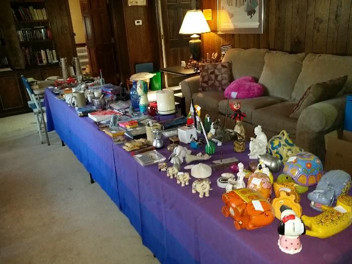 Collection of coin banks, lots of Snoopy collectibles throughout house; hard back and soft back books; sofa and loveseat - good condition
