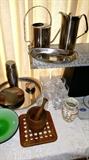 Mid century metalware....Cromargan German stainless....Vollrath....Iittala Gaissa highball glasses...teak mortar and pestle, trivet...     first floor
