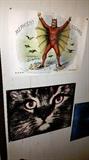 posters....cat and one other are blacklight   entry wall