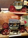 two scale model stage coaches, by Fisher Body Craftsman's Guild.  One comes with the original packing crate and paperwork.  They each measure about 16" long by about 10" tall....very unique     garage
