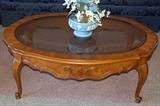 Thomasville Glass top coffee table (matches other tables)