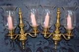 Brass wall candelabras