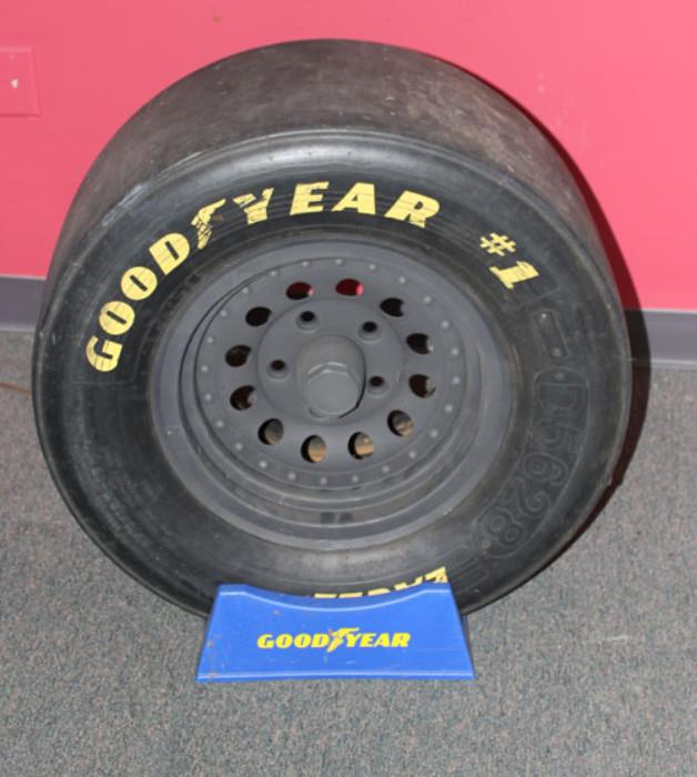 Full-size real Racing Slick Tire and Good Year stand.