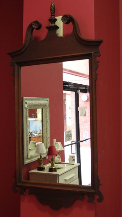 In addition to this Colonial style mirror, we have several mirrors here.