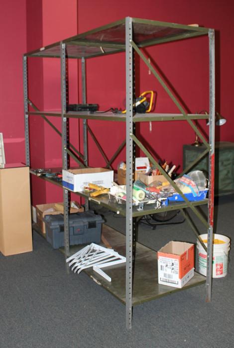 We have THREE Army surplus shelving units like this one to sell. They are modular and bolt together so you can change the configuration. Shelves are 30 by 42 inches. This one has eight shelves bolted together.