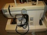 New Home Sewing Machine and Accessories