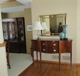 buffet / glass lamp / gold mirror
