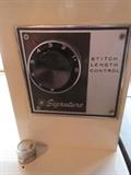 signature sewing machine w/ cabinet